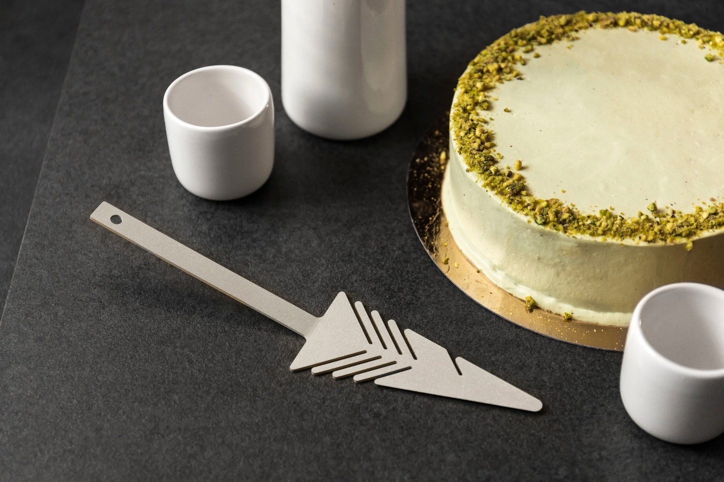 FURUNÅL kakespade i rustfritt stål