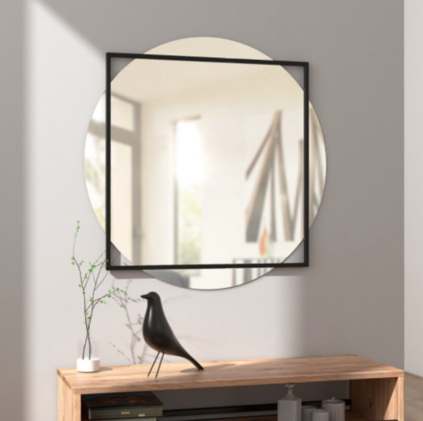 ILLUSJON veggspeil innrammet i en minimalistisk svart metallramme